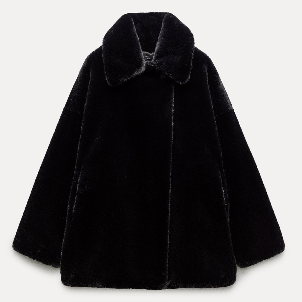 Fur black coat, beautiful coat, cozy and warm